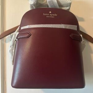 Kate Spade Burgundy Backpack NWT and packaging.